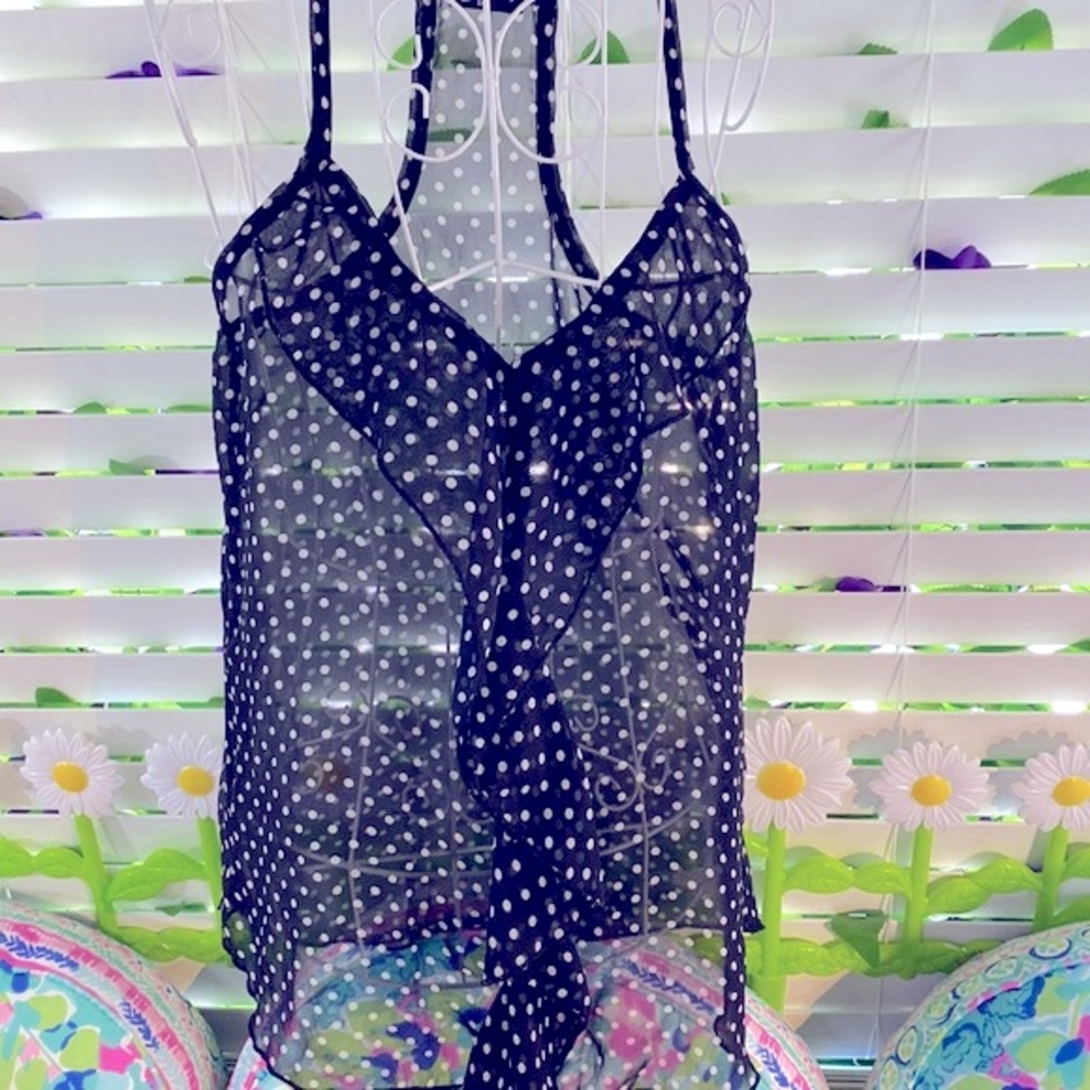 Sheer black ruffle top with white polka dots